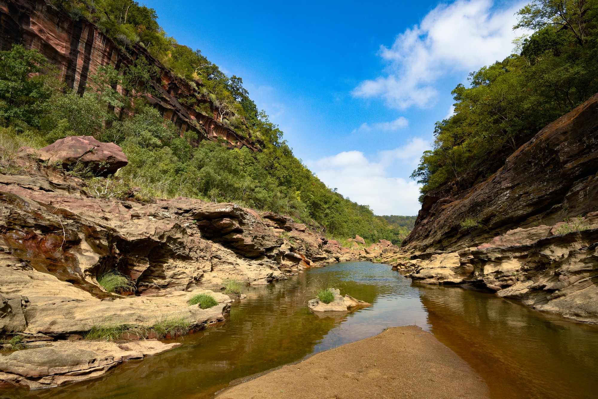 The Satpura Otter Saga - A view of a hill stream in the higher reaches of the Satpura hills flanked by rocky escarpments with occasional slivers of sand bars.A typical Eurasian otter habitat. Photo: Aditya Joshi/WCT